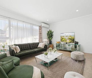 Sunny single level unit with covered deck - Photo 3