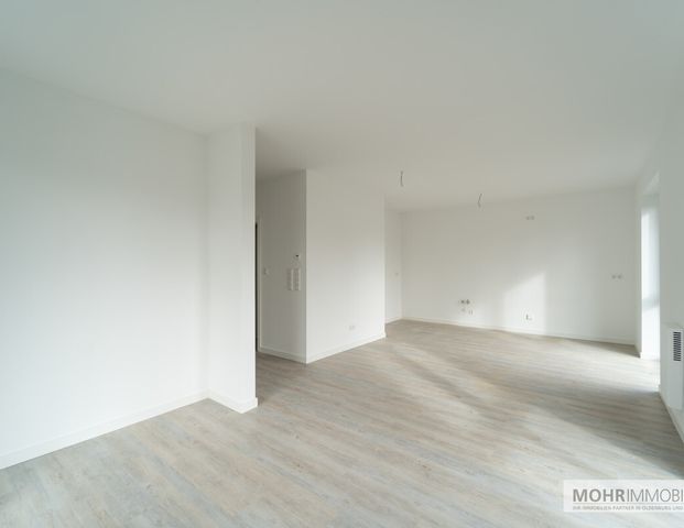 Moderne Neubauwohnung mit Süd-West Balkon zentral gelegen in Jever! - Foto 1