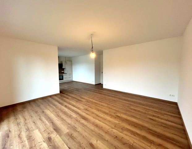 Augustfehn: Große Obergeschosswohnung mit Lift und Einbauküche | 91m² | KfW 40 - Foto 1