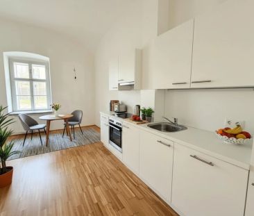 Wohnen mit Gartenidylle – Charmante 2-Zimmer-Wohnung mit großzügige... - Foto 3