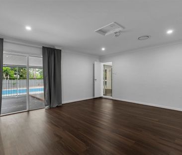 GREAT FAMILY FOREST LAKE HOME WITH POOL - Photo 1