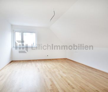 Neuwertige Maisonettewohnung mit Einbauküche und zwei TG-Stellplätzen - Photo 4