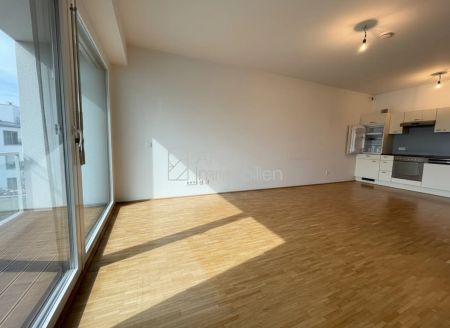 Schöne 2 Zimmerwohnung mit sonniger Südterrasse - Tiefgaragenabstellplatz optional - Photo 2