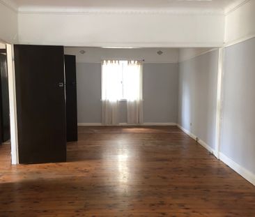 Charming 3-Bedroom Home in a Prime Location - Photo 2