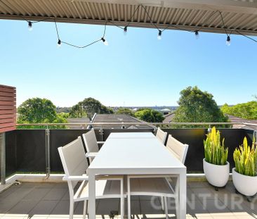 Elevated Luxury with Soaring Ceilings & Water Views - Photo 5