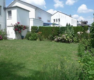 Modernisierte 4,5-Zi-Maisonettewohnung mit eigenem Garten in Bad Go... - Foto 1