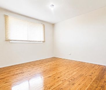 Spacious 5-Bedroom Home with Multiple Ensuites & Rear Balcony - Photo 6