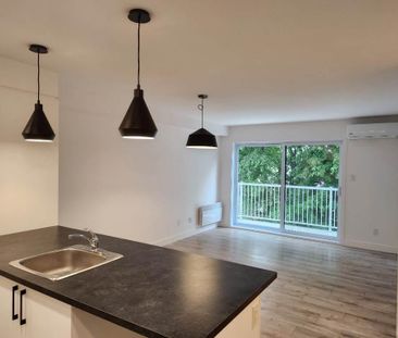 PROMOTION**3 ½ avec Espace BUREAU**et stationnement - Photo 2