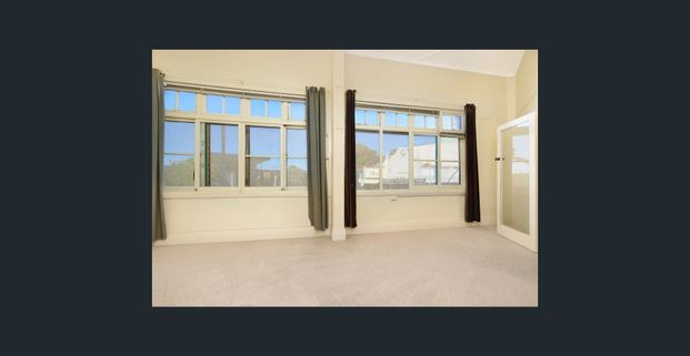 Spacious Two-Bedroom Apartment with Sunroom & Separate Entry - Photo 1