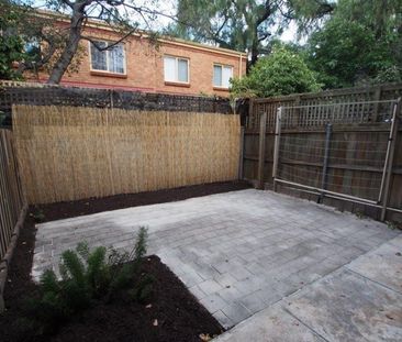 Spacious 2 bedroom townhouse in private garden setting - Photo 6