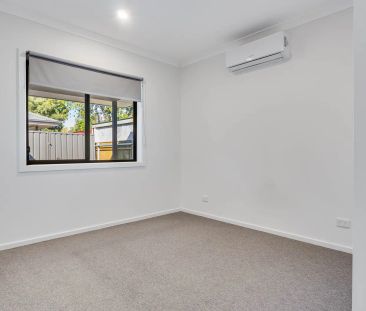 Modern, Stylish & Sleek Living in Prime North Albury Location - Photo 4