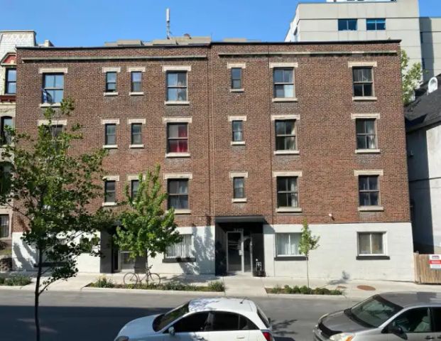Chateau St-Andre | 3431 Rue St-Andre, Montreal - Photo 1