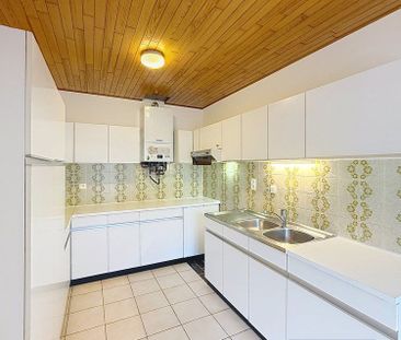 Ruim appartement met 2 slaapkamers en garage - Photo 2