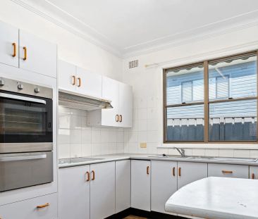 Live in comfort while relishing the picturesque beauty of Lake Macq... - Photo 4