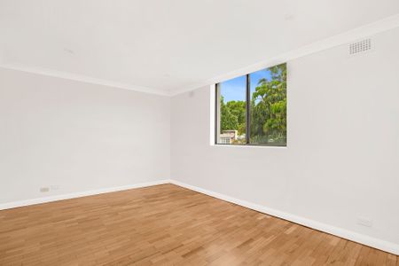 Ultra Convenient Apartment with Secure Garage - Photo 3