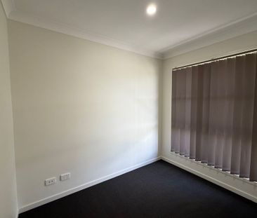 Beautiful 4-Bedroom Family Home with Study & Outdoor Entertaining Area - Photo 6