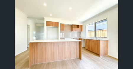 Brand New Family Living in a Prime Location - Photo 4