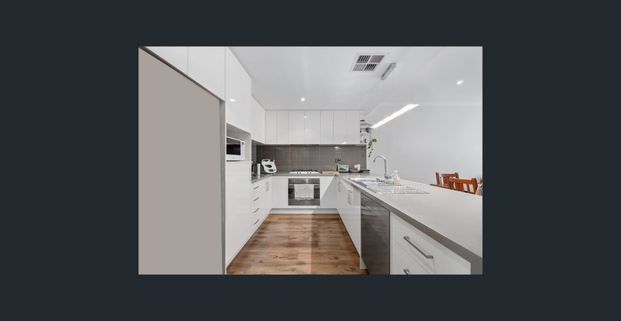 STYLISH & SECURE TOWNHOUSE! - Photo 1