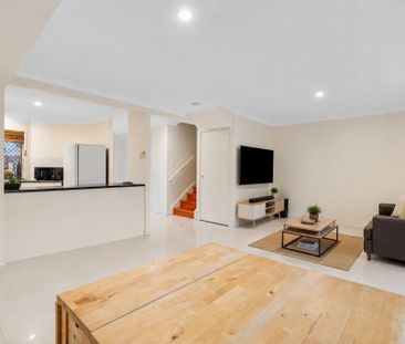 Two-Level Townhouse in an Ultra-Convenient Location - Photo 4