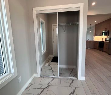 9711 Huxbury Dr NE — Main floor - Photo 1