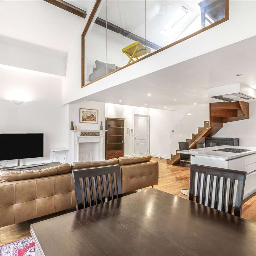 Stunning two bedroom apartment in a charming period building with gated access, off-street parking and communal gardens. - Photo 1