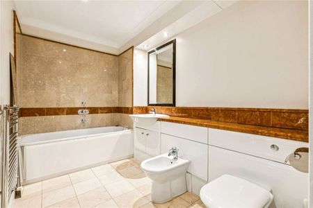 A modern three bedroom town house with river views and roof terrace in prestigious Harrods Village - Photo 3