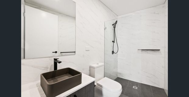 Sun-Drenched, Spacious Living with Oversized Balcony - Photo 1