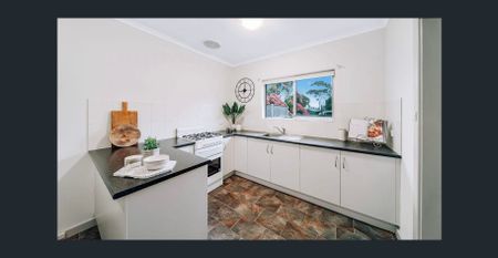 Charming and Immaculate Unit in a Prime Location! - Photo 2