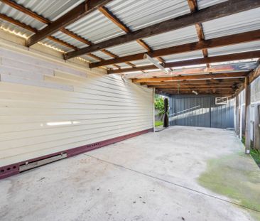 Four-Bedroom Family Home with Dual Driveways and Shedding - Photo 1