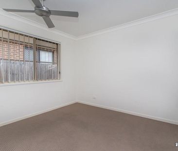 Spacious 4-Bedroom Home with Low-Maintenance Yard - Photo 6