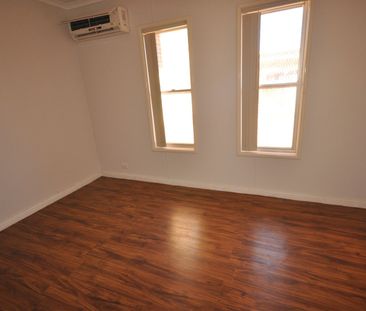 Spacious 3-Bedroom Home with Storeroom & Ample Parking - Photo 3