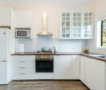 NEAT AND TIDY 3 BEDROOM HOME WITH HOME OFFICE - Photo 3