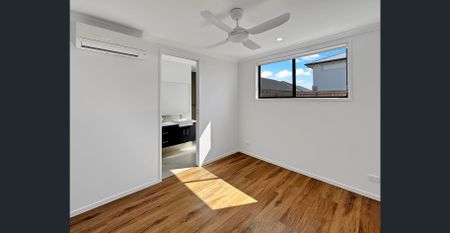 Stylish Family Home with Pool in Sought-After Palmview - Photo 3