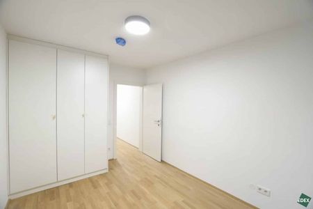 Erstbezug: Schöner 3-Zimmer-Neubau mit Terrasse und Garten - Photo 5