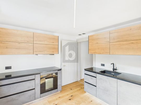 GENEROUS AND NEWLY RENOVATED - Photo 1