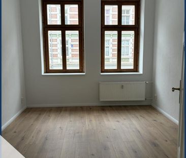 Frisch renovierte 2-Raumwohnung mit Einbauküche & ca. 50 m² Wohnkom... - Foto 5