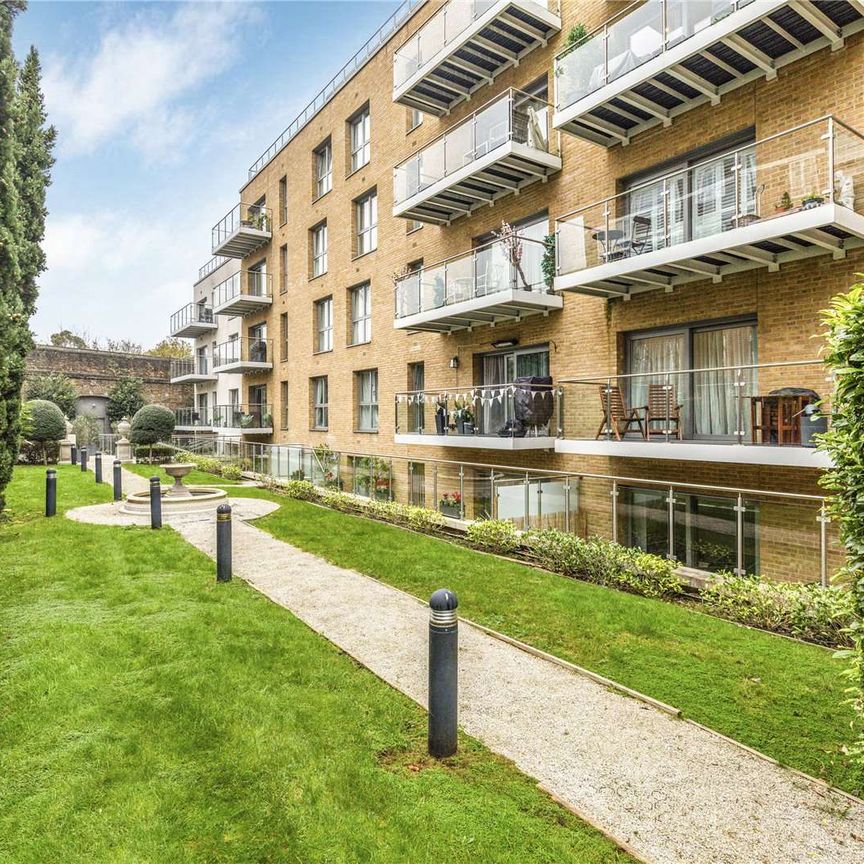 A superb two bedroom second floor flat in this desirable gated development moments from East Putney underground station with allocated parking. - Photo 1