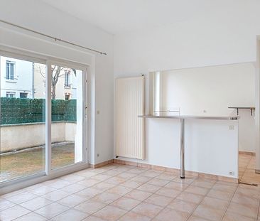 Appartement à louer - REIMS ST MARCEAUX - Photo 4