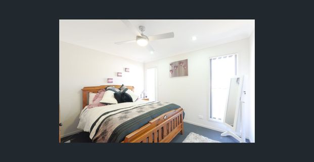 Situated in the quiet suburb of Springfield Lakes, this beautiful property is just waiting for you to call it home! - Photo 1