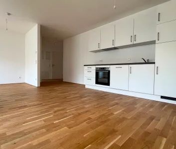 Urbaner Wohnhit: Hochwertige Neubauwohnung mit neuer Küche & Loggia ab sofort - Photo 3