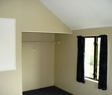 Fenced courtyard, garden and single garage with this two bedroom to... - Photo 6