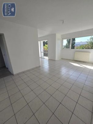 Appartement à louer 4 pièces 67.5m² - Photo 1
