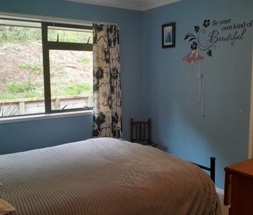 Charming 4-Bedroom Family Home in Kauri - Photo 3