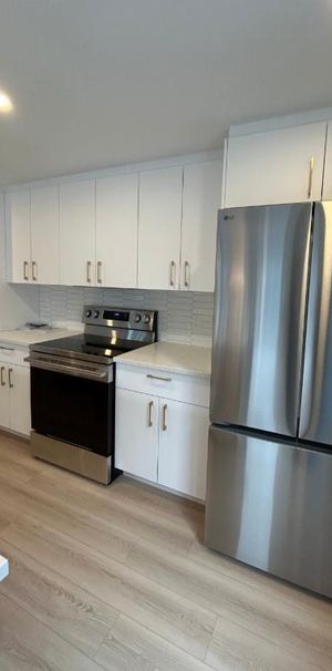 Grand 4 1/2 avec 2 chambres et 2 salles de bains - Photo 1