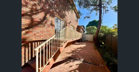 Charming Bayside Family Home –Tranquil corner block at Prime Location - Photo 3