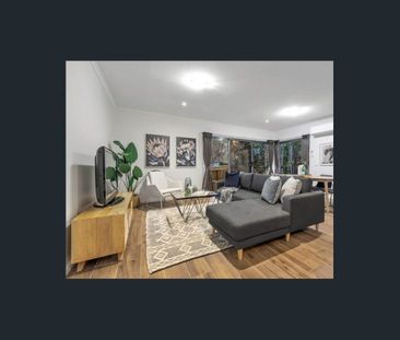 Contemporary Townhouse with Modern Comforts and Prime Location - Photo 2