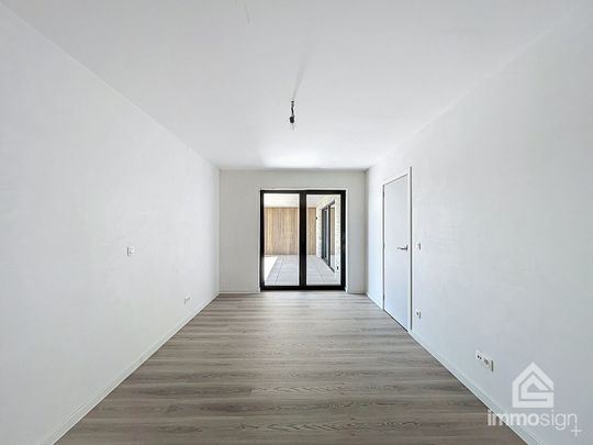 Instapklaar nieuwbouwappartement met 2 slaapkamers, terras en autostaanplaats te Kinrooi - Foto 1