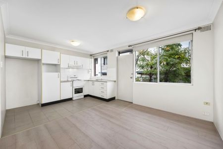 Bright, Renovated Two Bedroom ** Available 11/11/25 ** - Photo 2