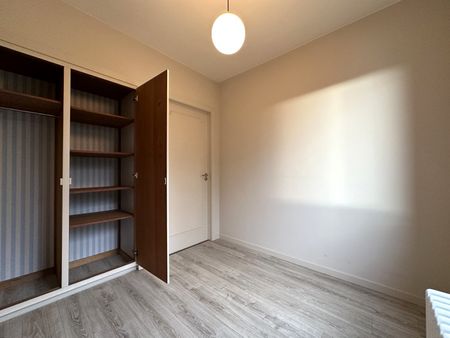 Lichtrijk appartement met drie slaapkamers - Photo 2