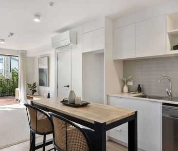 Modern Ground-Floor 2 Bedroom Apartment with Private Sun-Filled Cou... - Photo 3